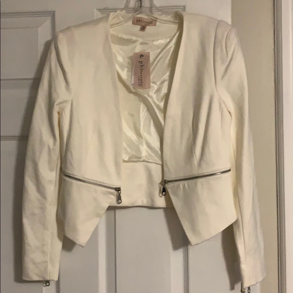 Cream color blazer.